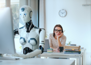 Robot and businesswoman working together at a desk, representing AI-assisted PIP writing