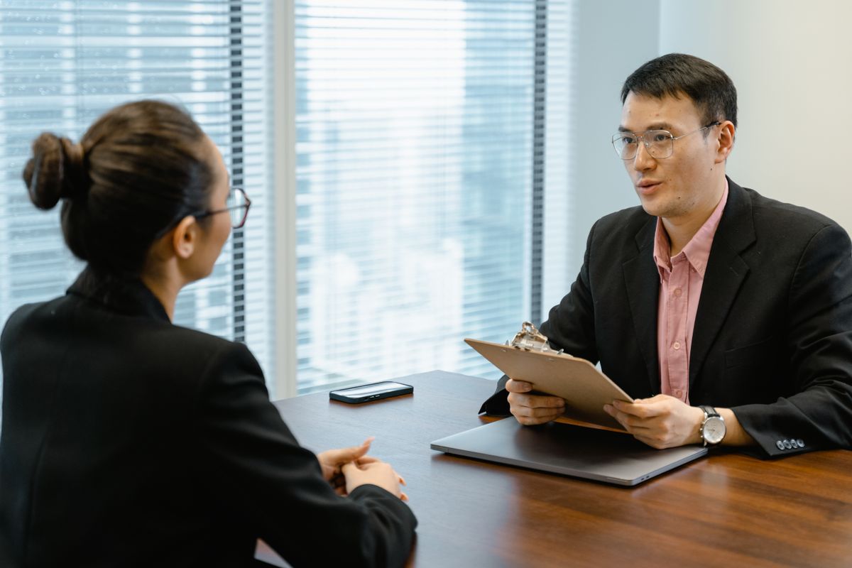 Man and woman having a discussion in an office